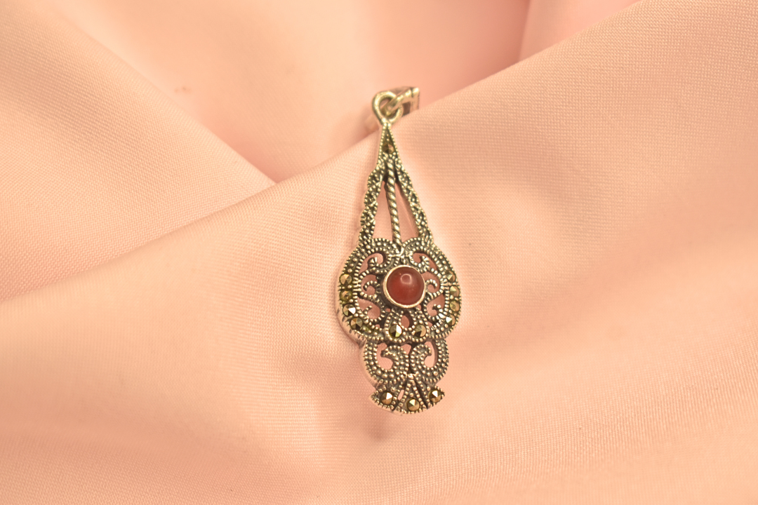 Vintage-Inspired Silver Pendant with Caramel Gemstone Accent