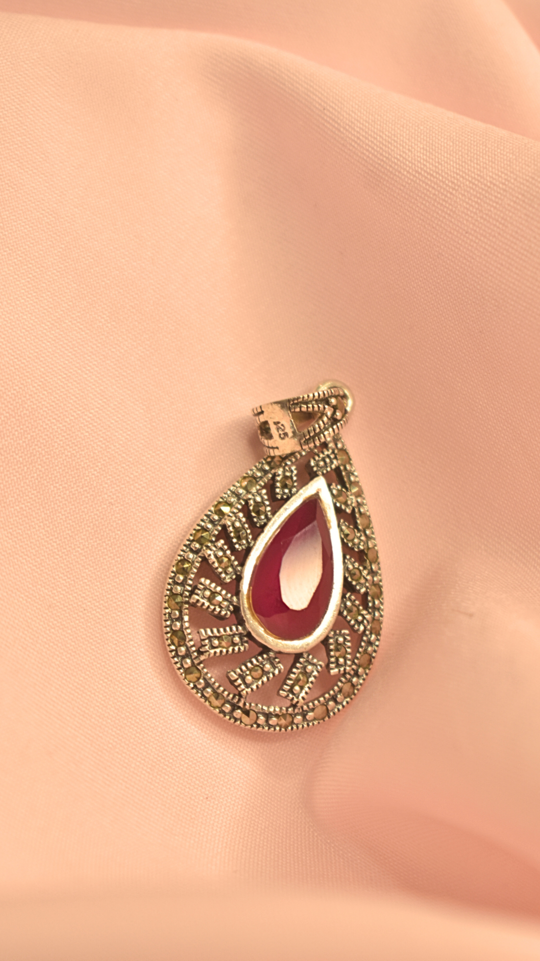 Elegant Silver Pendant with Teardrop Pink Gemstone