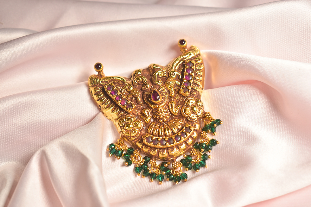 Exquisite Gold Pendant with Gemstone Detailing