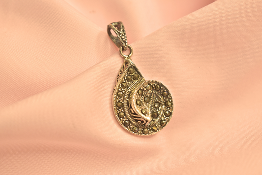 Vintage Teardrop Pendant with Intricate Detailing and Gemstone Accents