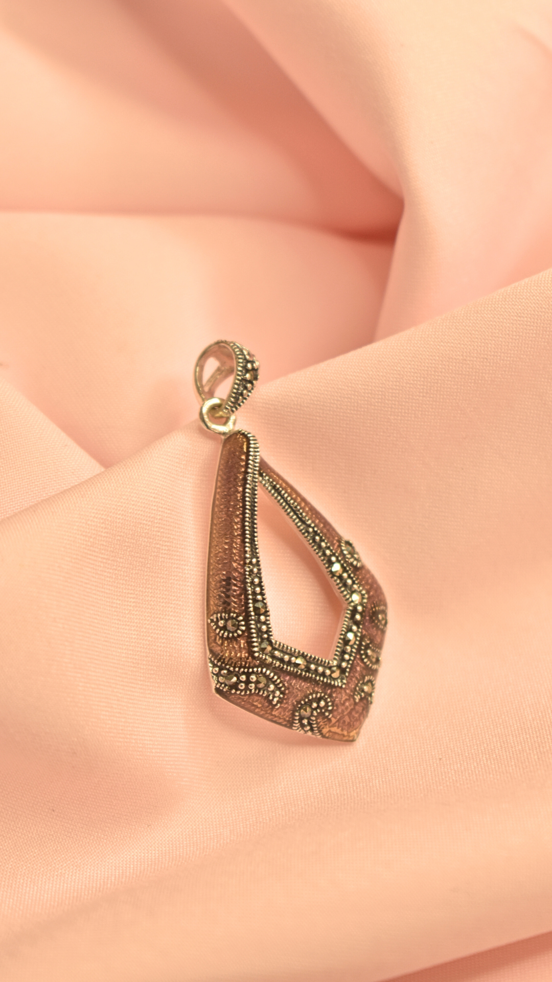 Vintage-Inspired Silver Pendant with Intricate Detailing